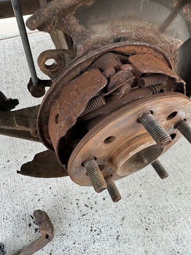 A close up of a car's brake assembly